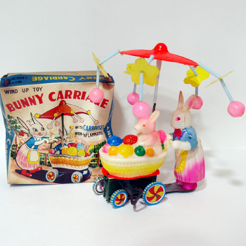 BUNNY CARRIAGE WITH CARROUSEL WIND UP TOY